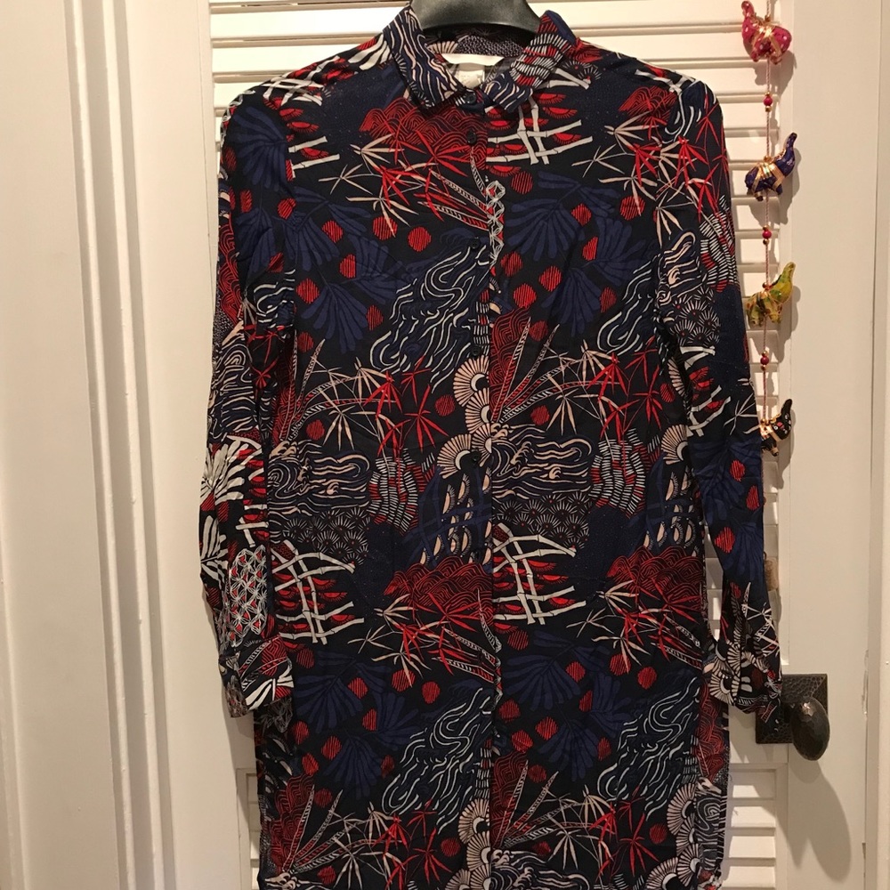 Printed long button down shirt.